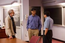 Lehigh University Math - Three men discussing the lecture material