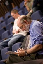 Lehigh University Math - Man taking notes at the lecture